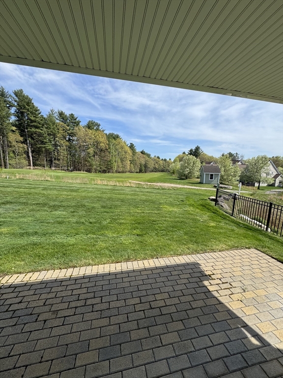 53 Baldwin Road, Unit 1401 Billerica, MA 01821 - Photo 5 of 32 a view of a back yard