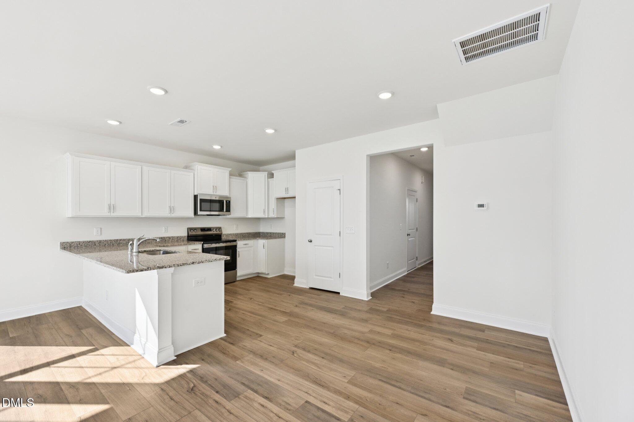 6429 Granite Quarry Drive Raleigh, NC 27610 - Photo 10 of 64 Kitchen/Dining Area