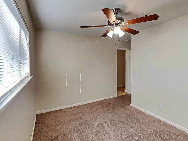 a view of a hallway with closet