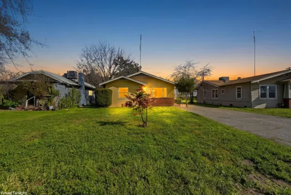 a house view with a garden space