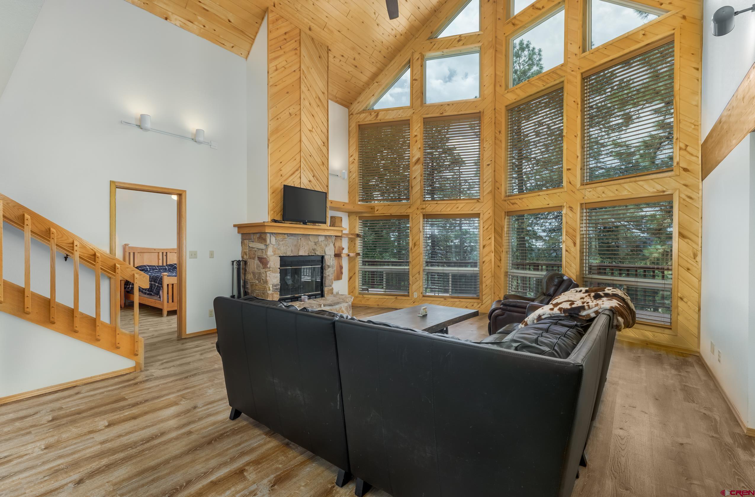 197 Buckhorn Road Bayfield, CO 81122 - Photo 8 of 34 a living room with furniture and a large window