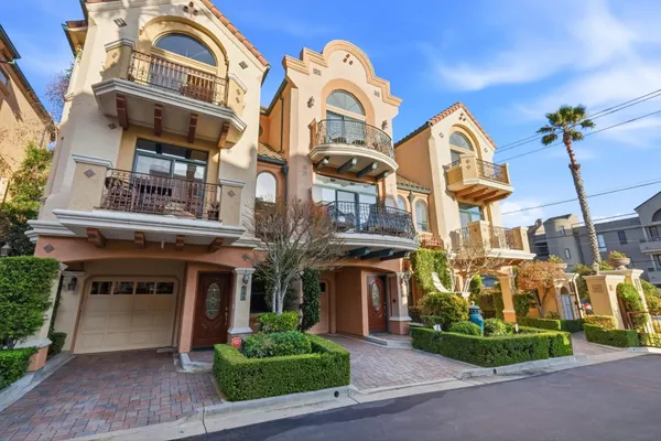 a view of a building with a garden