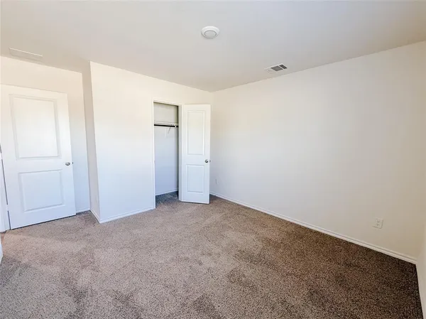 an empty room with an entryway