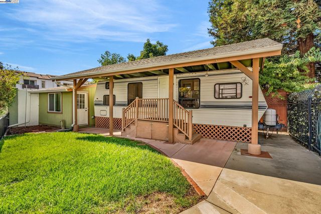 a bathroom with a shower and toilet
