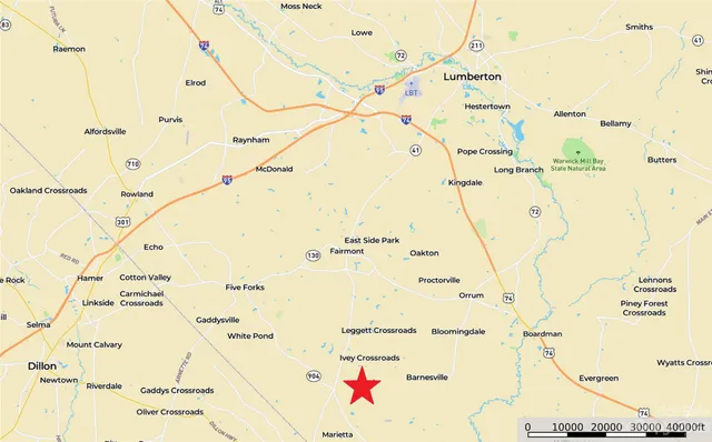 a white bath tub sitting next to a shower