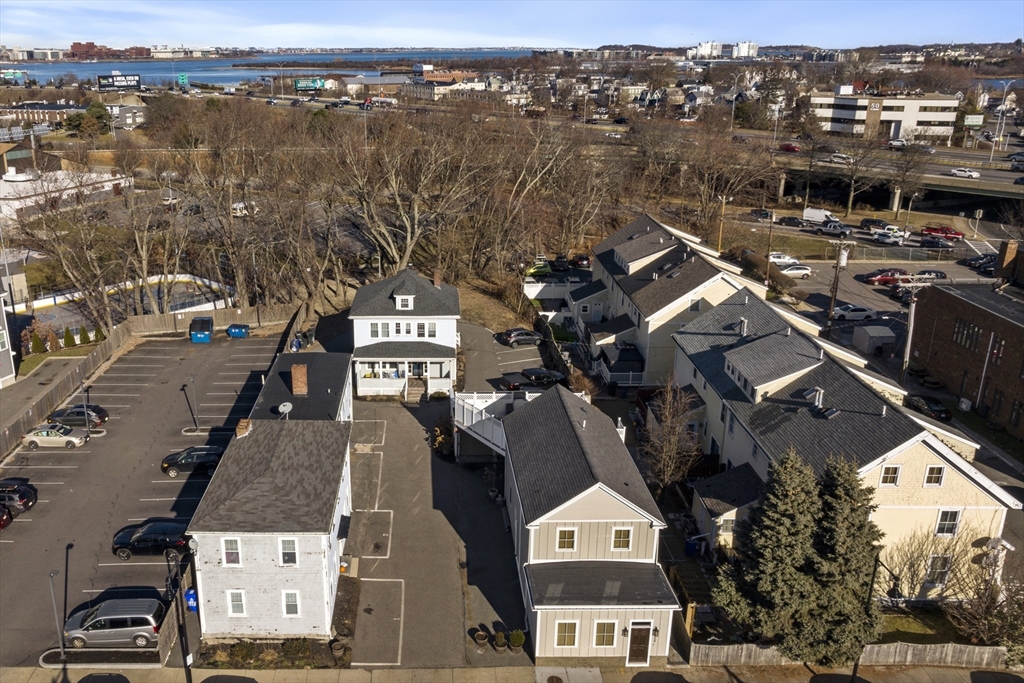378-380 Neponset Avenue Boston, MA 02122 - Photo 16 of 33 an aerial view of a house with a lake view