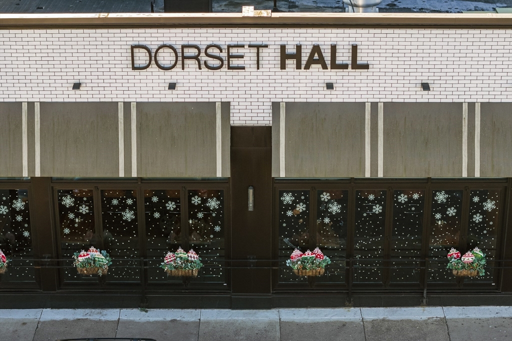 378-380 Neponset Avenue Boston, MA 02122 - Photo 33 of 33 a front view of building with an entrance and flowers