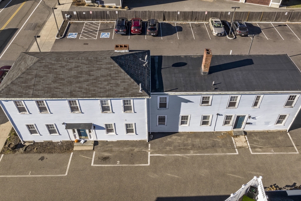 378-380 Neponset Avenue Boston, MA 02122 - Photo 4 of 33 an aerial view of a house with swimming pool