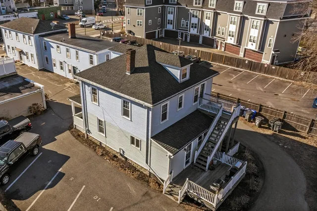a view of a house with a street