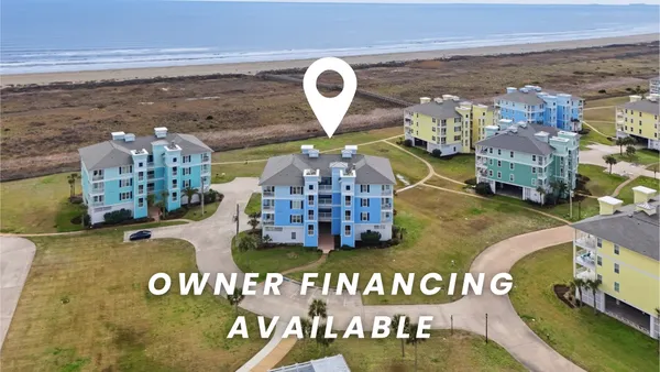 a view of entryway with furniture and wooden floor