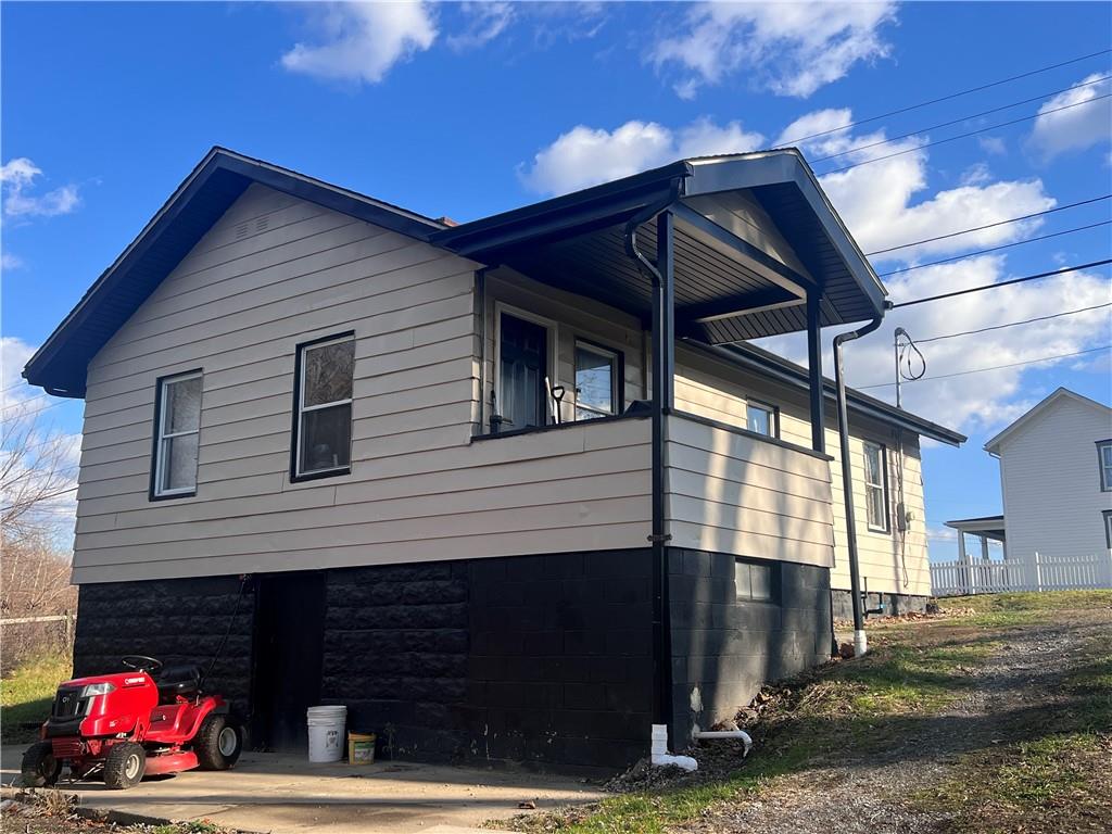 1747 Galilee Road Wampum, PA 16157 - Photo 2 of 11 a view of a house with a yard