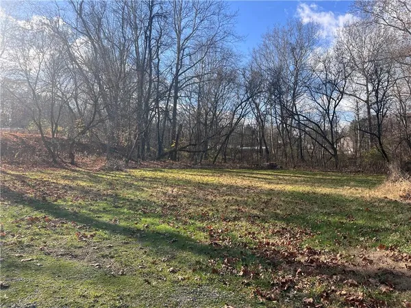 a view of swimming pool with a yard