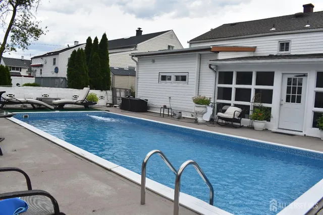 a backyard of a house with seating space