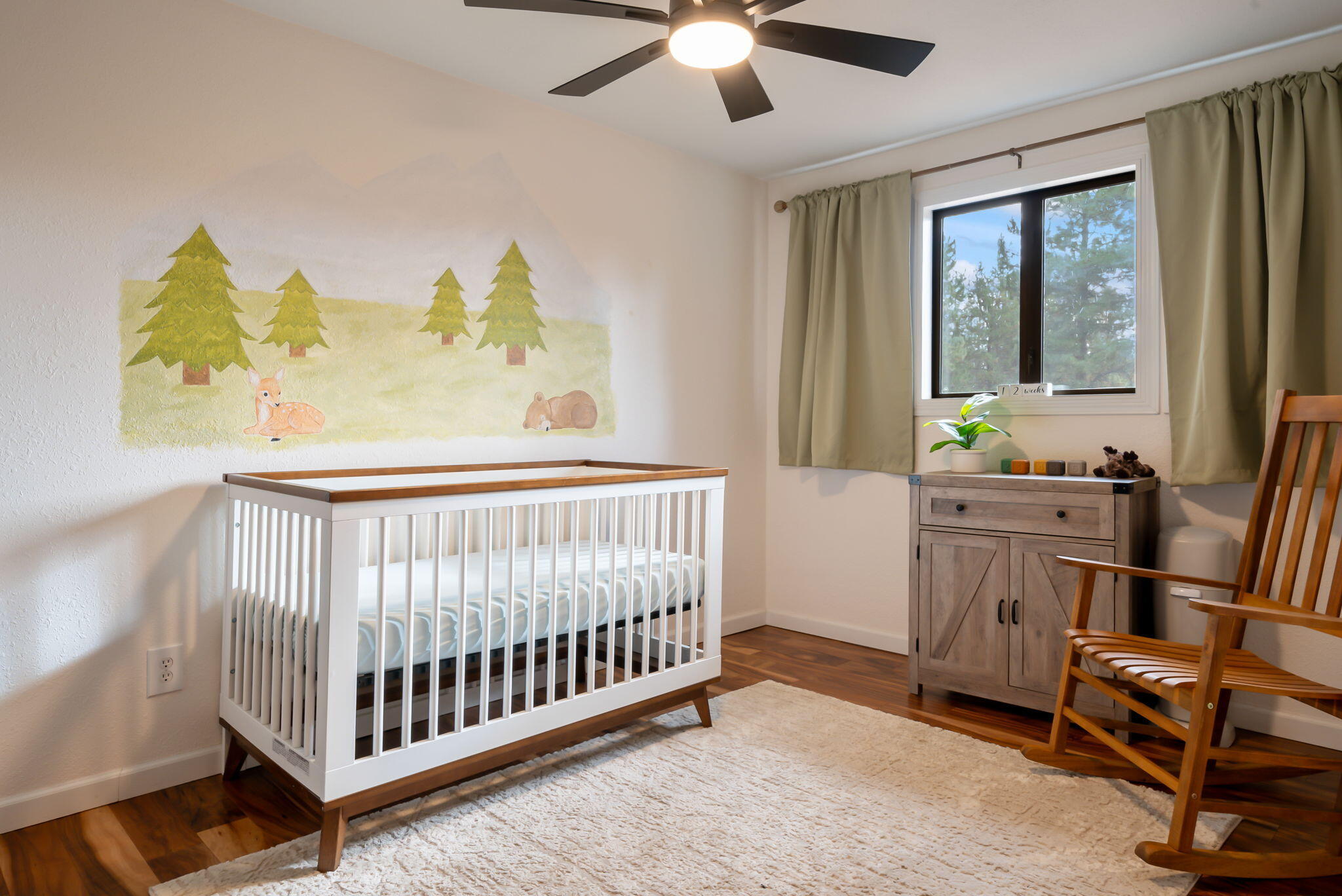 16879 Elsinore Road Bend, OR 97707 - Photo 21 of 48 a bedroom with furniture and a window