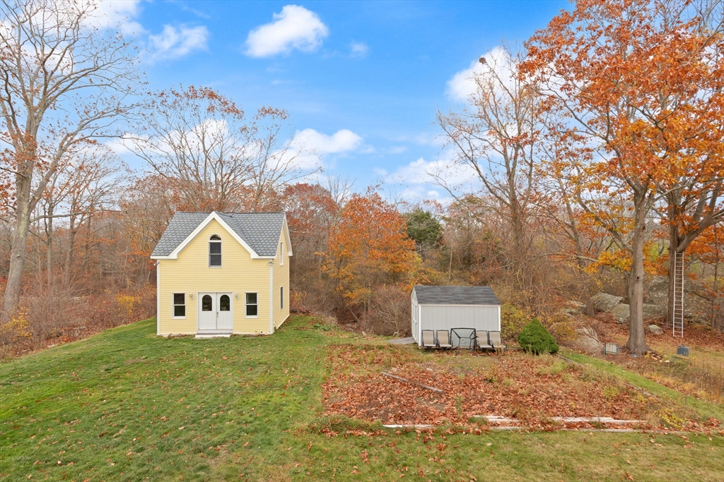 20 Calder Street Gloucester, MA 01930 - Photo 2 of 27 a view of a house with a yard