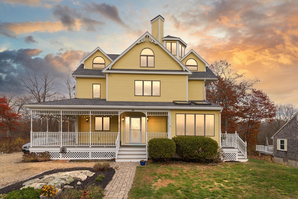 20 Calder Street Gloucester, MA 01930 - Photo 25 of 27 a front view of a house with a yard