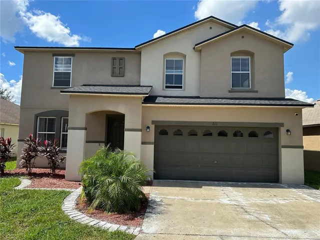 a front view of house with yard