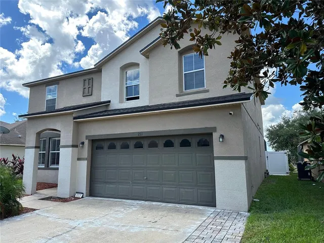 a house view with a outdoor space