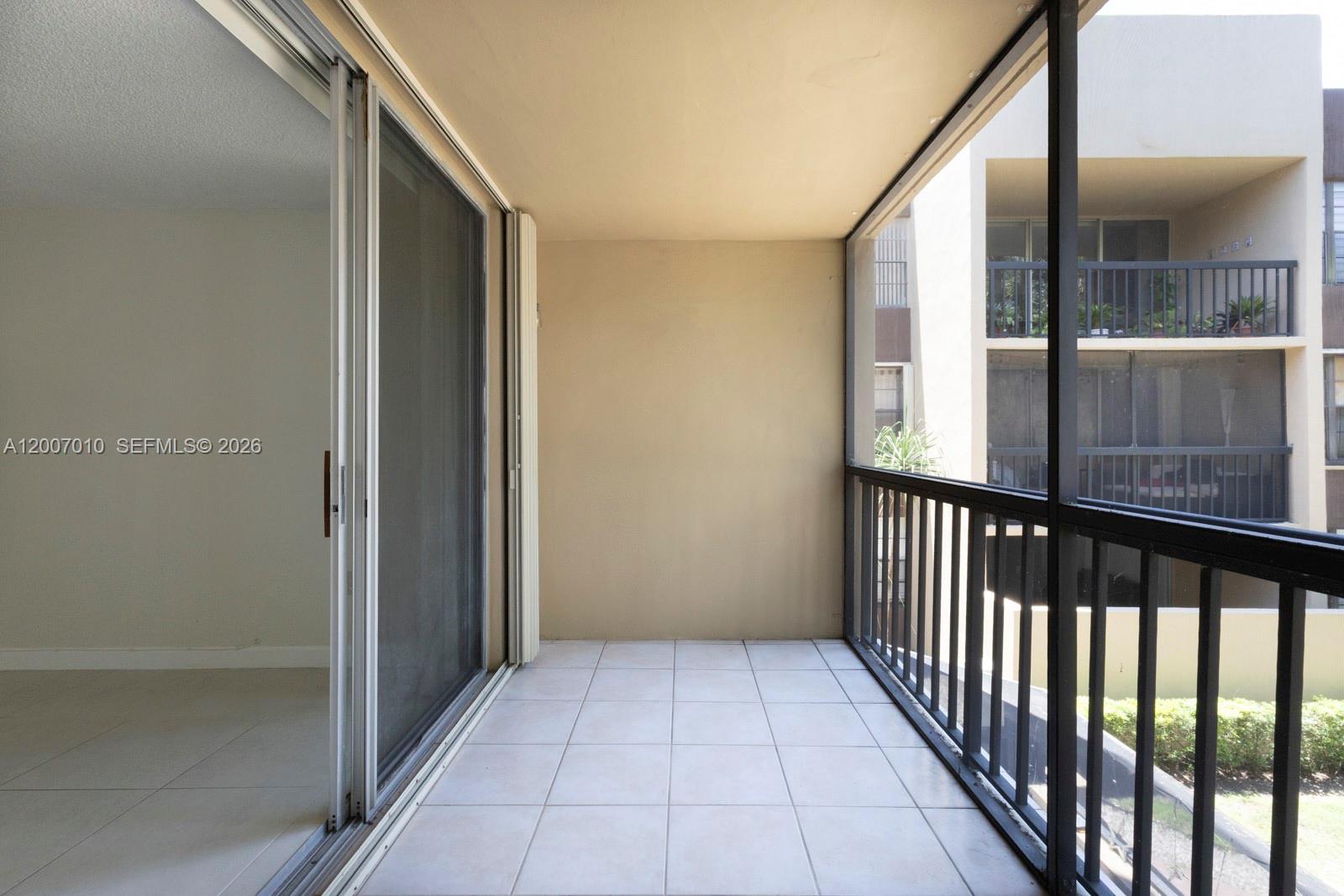 10855 Southwest 112th Avenue, Unit 211 Miami, FL 33176 - Photo 14 of 23 a view of a balcony