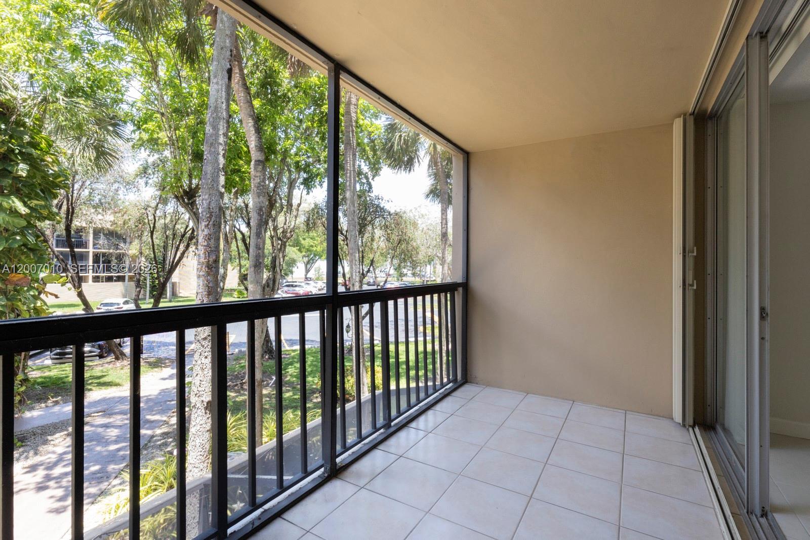 10855 Southwest 112th Avenue, Unit 211 Miami, FL 33176 - Photo 15 of 23 a view of a porch