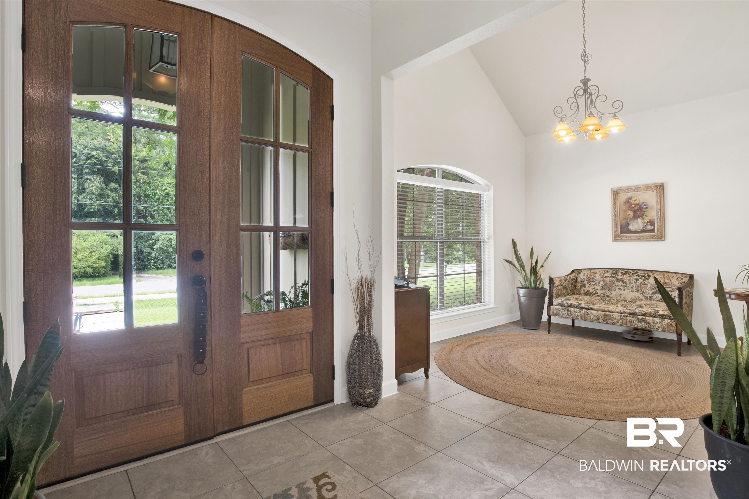 10368 Gayfer Rd Extension Fairhope, AL 36532 - Photo 13 of 43 Gridded double entry doors open to a tiled foyer with a vaulted ceiling