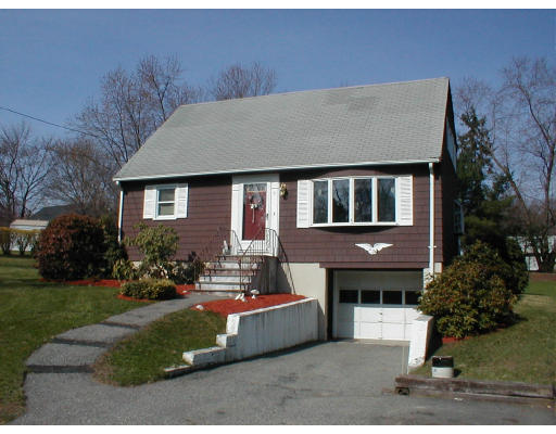 7 Roberts Road Billerica, MA 01821 - Photo 1 of 1 a front view of a house with a yard