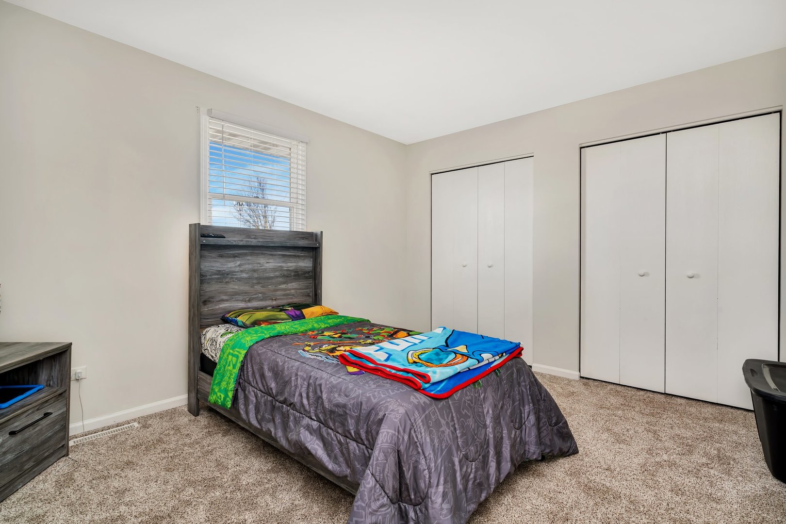 403 South Raven Road Shorewood, IL 60404 - Photo 14 of 24 a bedroom with a bed and a window