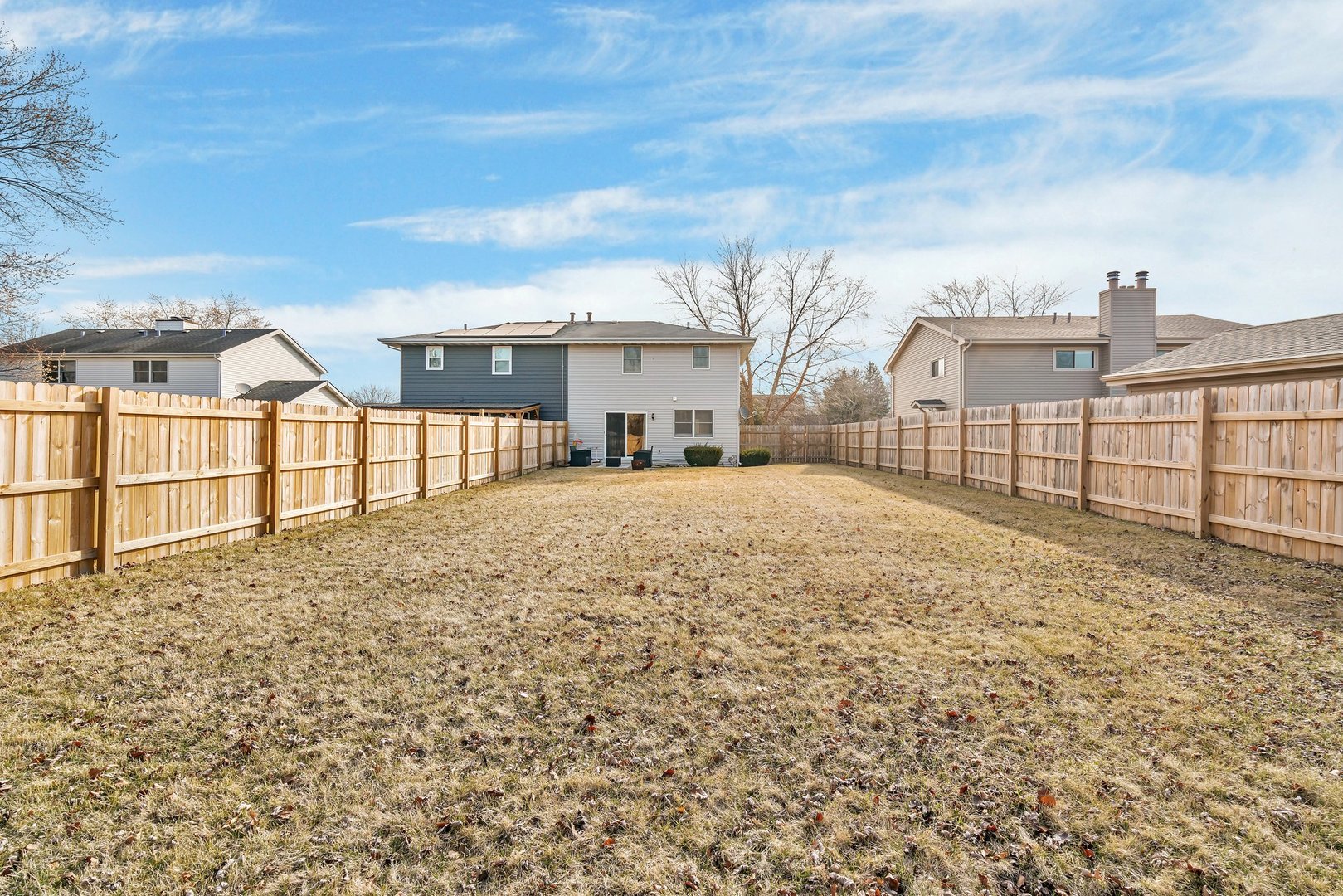 403 South Raven Road Shorewood, IL 60404 - Photo 23 of 24 a view of a backyard with a large tree