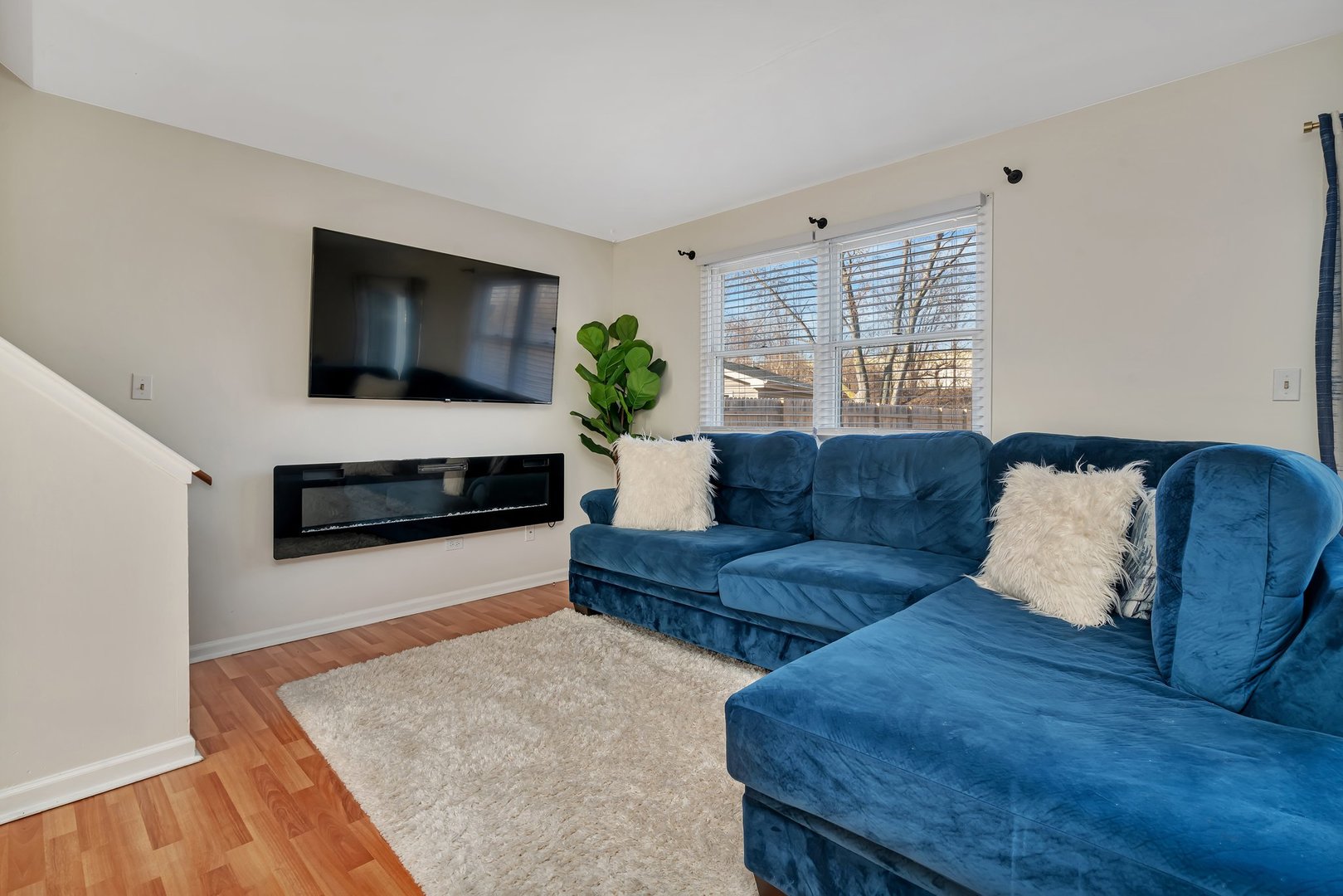 403 South Raven Road Shorewood, IL 60404 - Photo 3 of 24 a living room with furniture and a flat screen tv