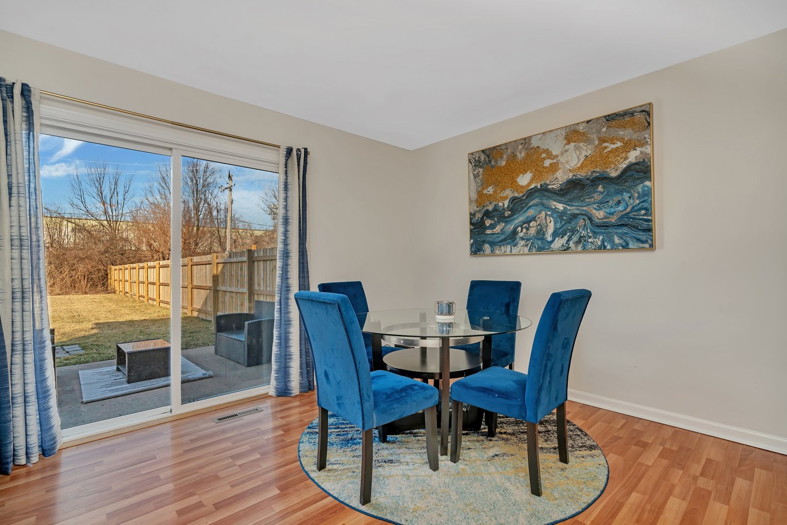 403 South Raven Road Shorewood, IL 60404 - Photo 6 of 24 a view of a dining room with furniture wooden floor and a window