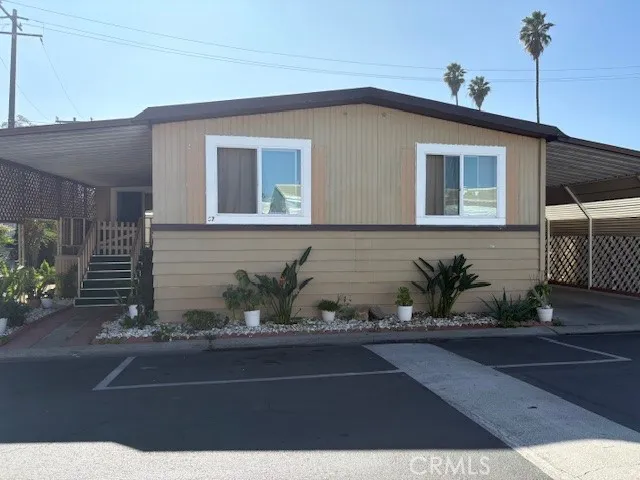 a front view of a house with garage