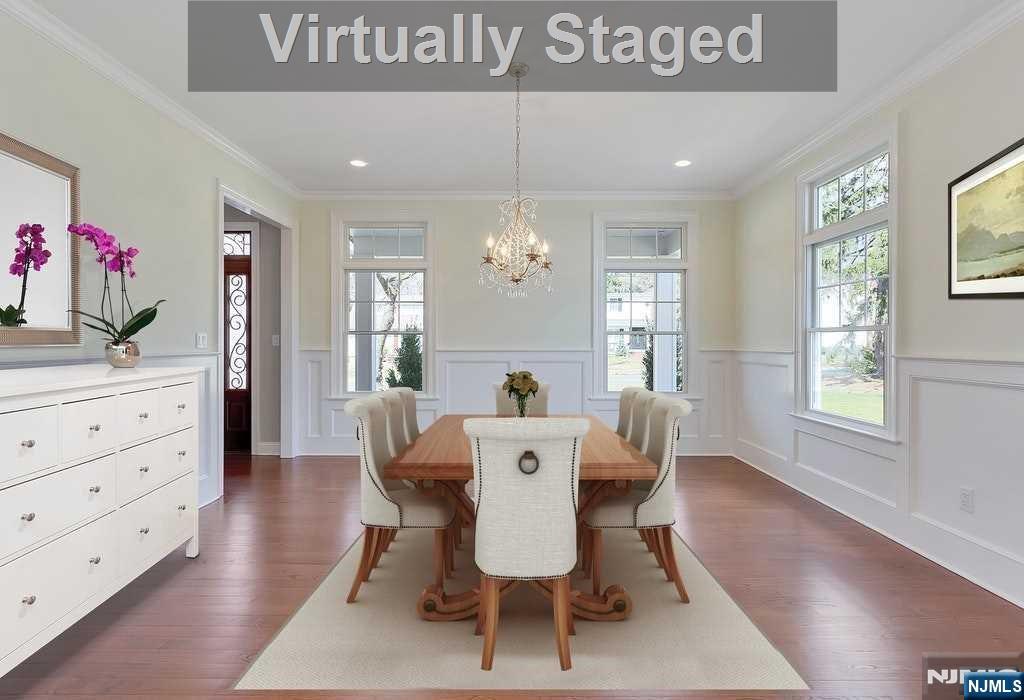 582 Green Valley Road Paramus, NJ 07652 - Photo 5 of 25 a view of a dining room with furniture window and wooden floor