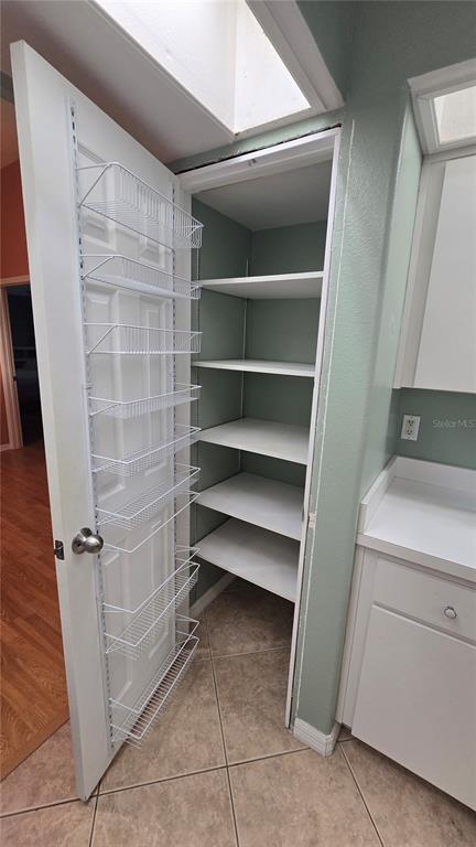 6501 Borg Street Leesburg, FL 34748 - Photo 14 of 59 a view of storage and utility room with washer and dryer
