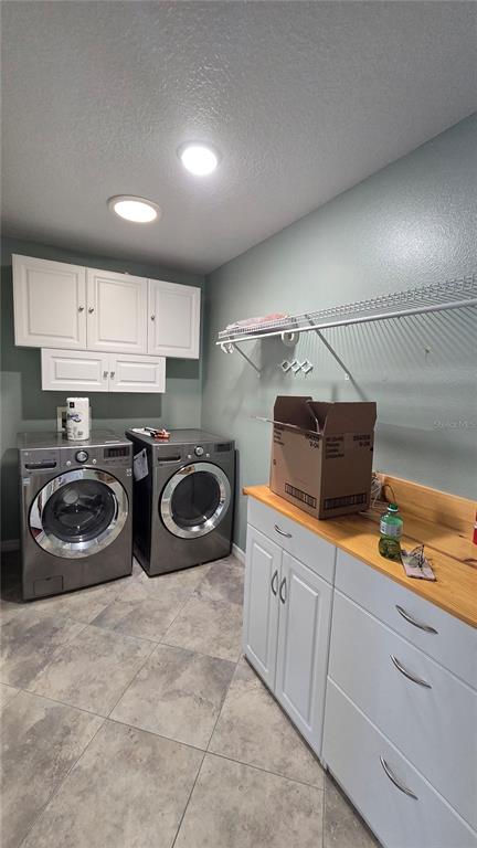 6501 Borg Street Leesburg, FL 34748 - Photo 15 of 59 a kitchen with a stove a sink and a cabinets