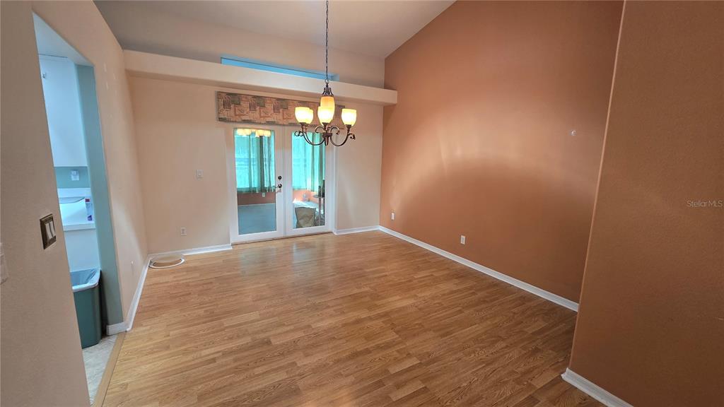 6501 Borg Street Leesburg, FL 34748 - Photo 20 of 59 a view of empty room with window and outdoor view