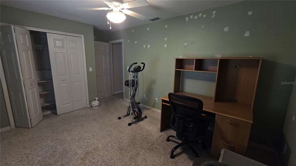 6501 Borg Street Leesburg, FL 34748 - Photo 32 of 59 a view of a workspace with furniture