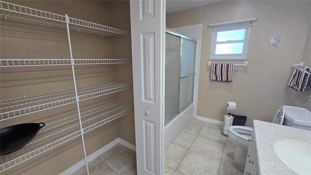 6501 Borg Street Leesburg, FL 34748 - Photo 37 of 59 a bathroom with a toilet and a shower