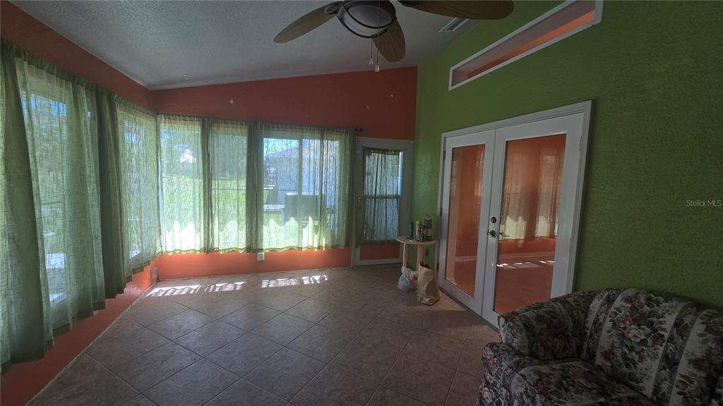 6501 Borg Street Leesburg, FL 34748 - Photo 41 of 59 a bed sitting in a room next to a window