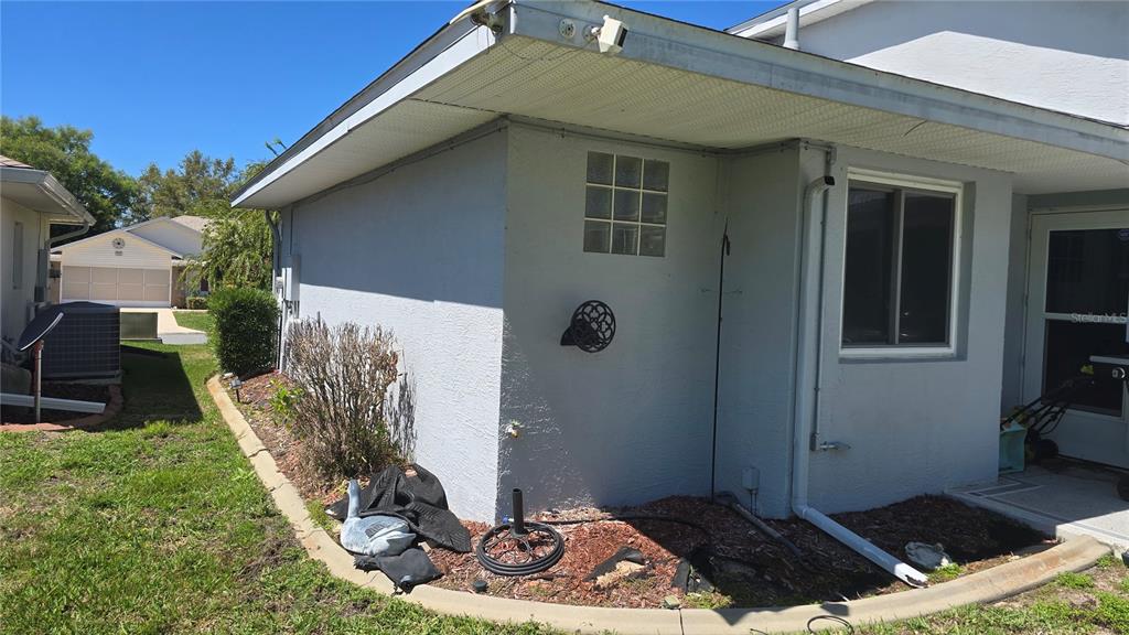 6501 Borg Street Leesburg, FL 34748 - Photo 47 of 59 a backyard of a house with seating space