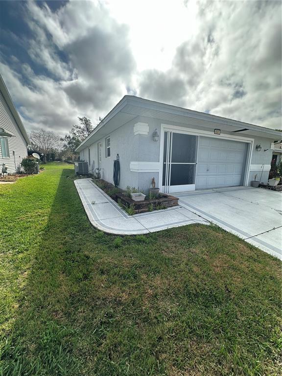 6501 Borg Street Leesburg, FL 34748 - Photo 49 of 59 a view of a backyard of the house