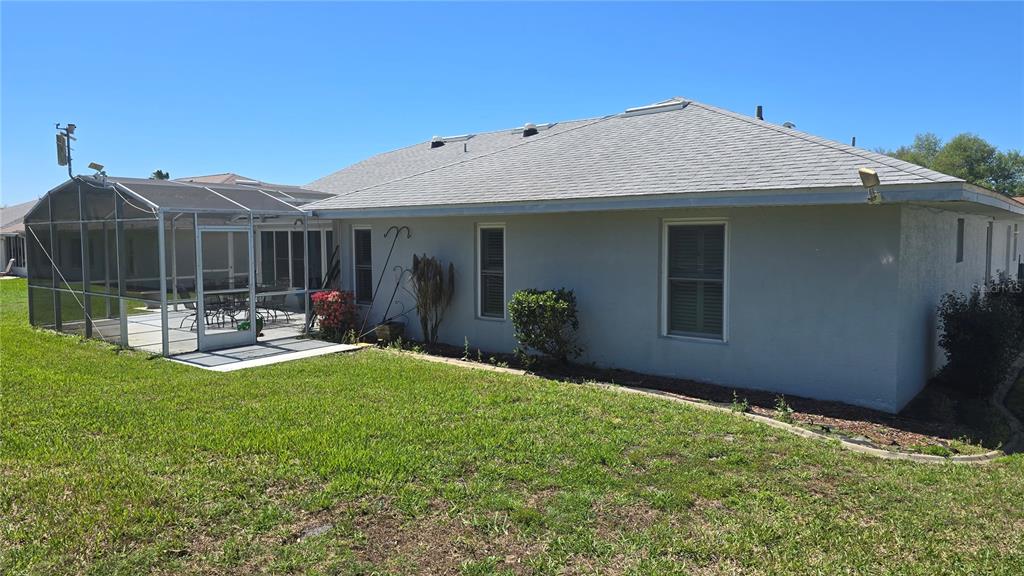 6501 Borg Street Leesburg, FL 34748 - Photo 52 of 59 a view of a house with backyard porch and sitting area