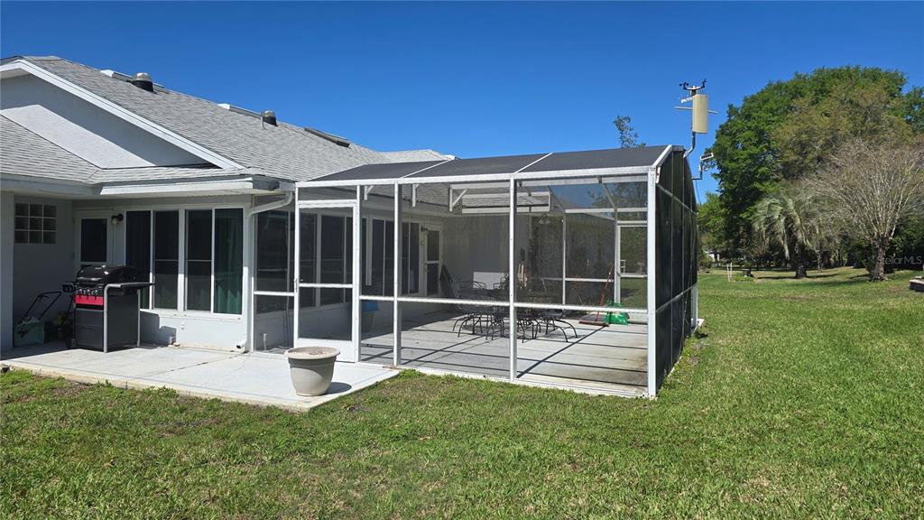 6501 Borg Street Leesburg, FL 34748 - Photo 53 of 59 a view of a house with backyard and porch