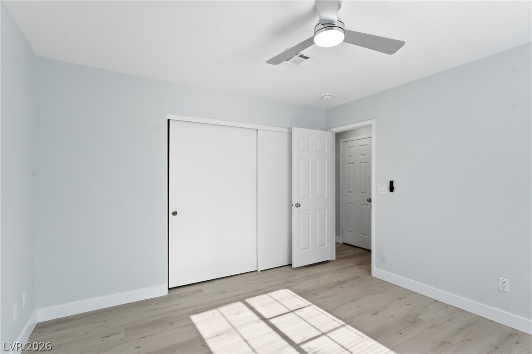 5449 Bugle Way, Unit 104 Las Vegas, NV 89108 - Photo 21 of 33 This bright and airy room offers a tranquil retreat with ample space and abundant natural light.