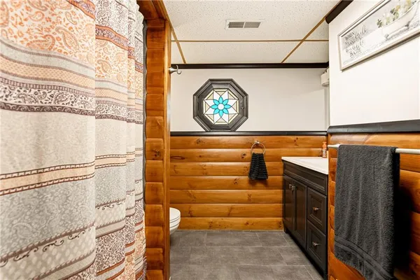 a bathroom with a bathtub and shower