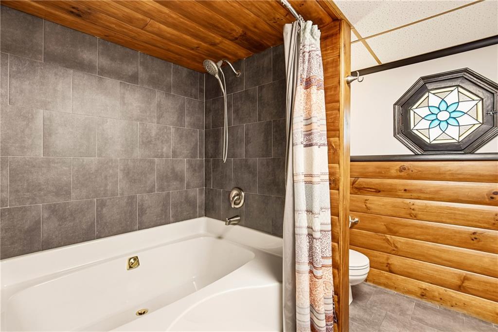 147 Weyant Road White, PA 15490 - Photo 25 of 47 a bathroom with a bathtub and shower