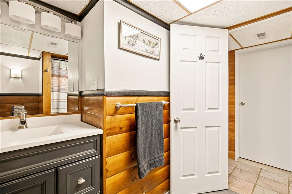 147 Weyant Road White, PA 15490 - Photo 26 of 47 a bathroom with a sink and a mirror