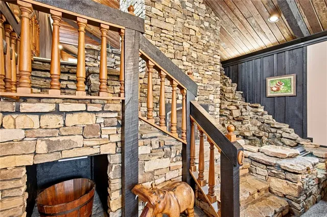 a view of a livingroom with furniture and flat screen tv