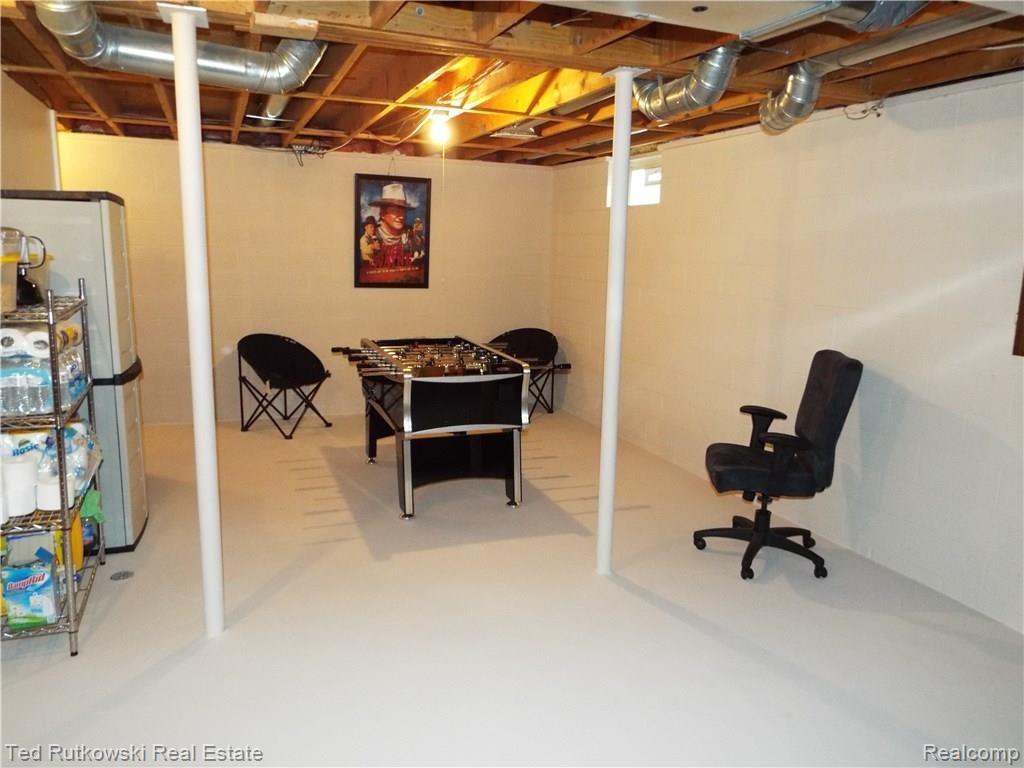 4435 Vincent Road North Street, MI 48049 - Photo 10 of 36 View of Basement with Foosball Table