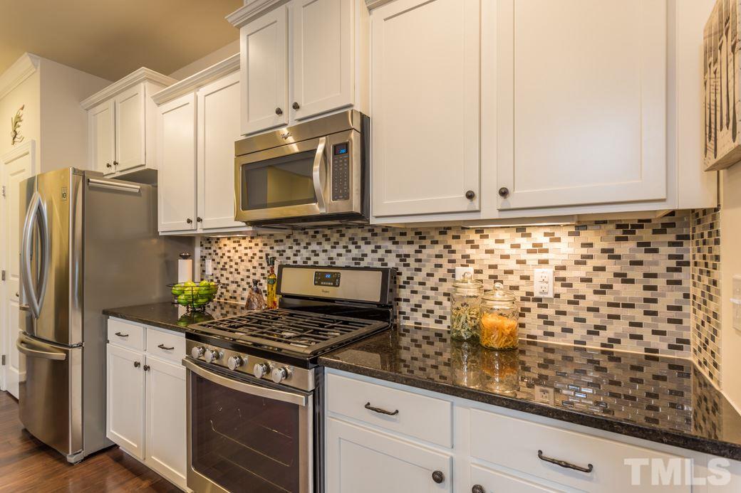 Kitchen has lots of counter and cabinet space.