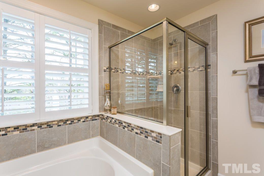 2458 Pecan Ridge Way Apex, NC 27502 - Photo 10 of 14 A touch of style with an upgraded tile in the master bath.